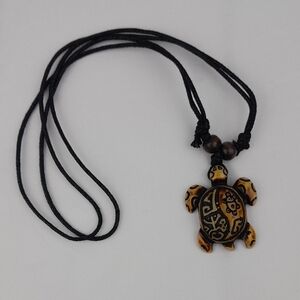 Carved Wooden Patterned Island Turtle Necklace